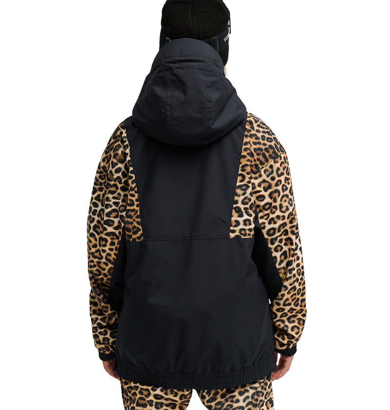 A person is shown from the back against a white background wearing the DC Shoes Chalet Anorak, a black insulated jacket featuring leopard print sleeves and accents, paired with matching leopard print pants and a black beanie. This stylish ensemble is designed by DC Shoes for optimal snow performance.