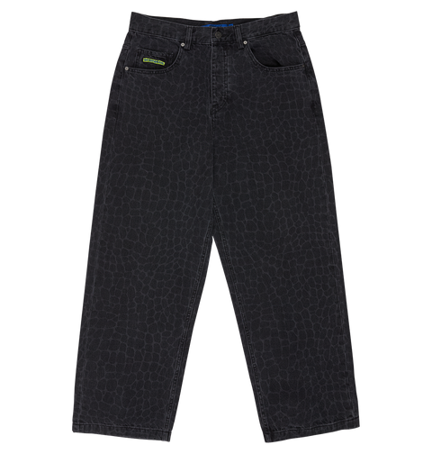 The DC Shoes Men's Baggy Denim Snake Print Pant features a subtle laser reptile-skin pattern, five pockets, a green label on one front pocket, and a baggy fit. Shown laid flat on a white background.