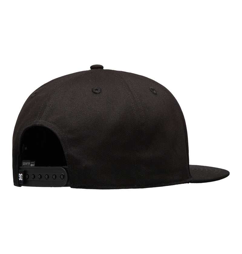 The Reebok DC Double That Cap is a black snapback featuring an adjustable strap at the back and a flat brim.