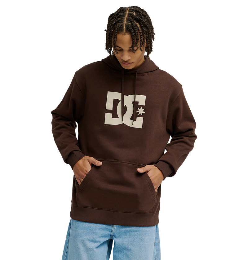 The Men's DC Star Hoodie by DC Shoes is a brown fleece pullover with a large light-colored DC logo on the chest and a front kangaroo pocket, shown against a white background.