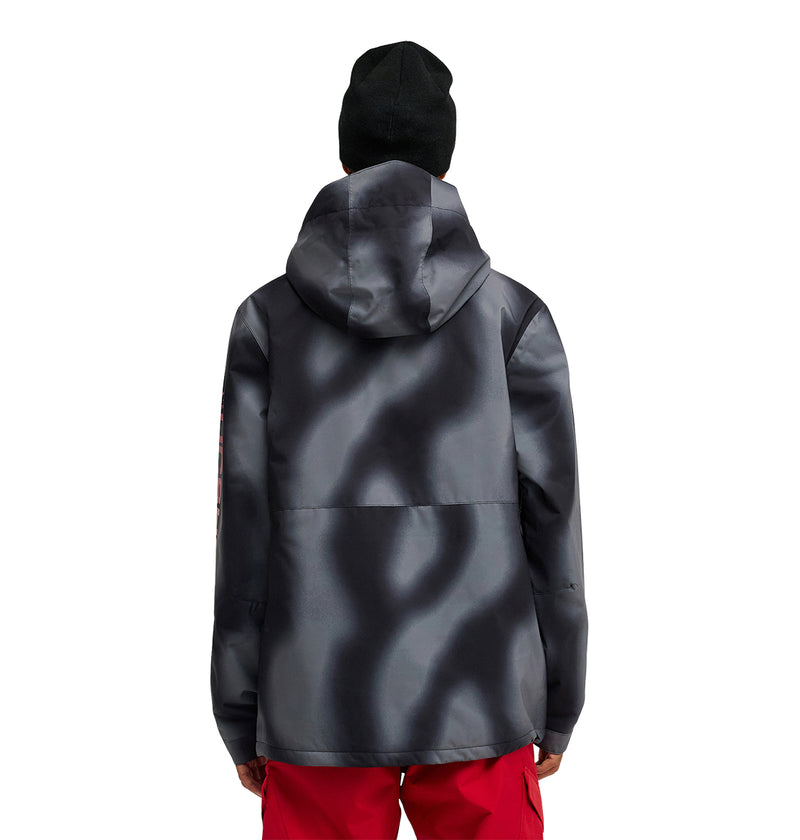 A person is shown from the back against a white background wearing a black beanie, red pants, and the DC Shoes Basis Jacket 10K—a dark gray and black insulated jacket with a wavy pattern.