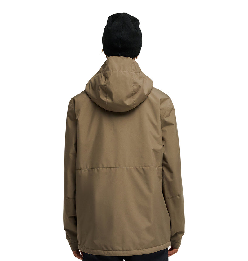 A person wearing a brown DC Shoes Basis Jacket 10K with a hood and a black beanie stands facing away from the camera against a plain white background.