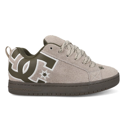 Gray sneaker with green accents on a white background