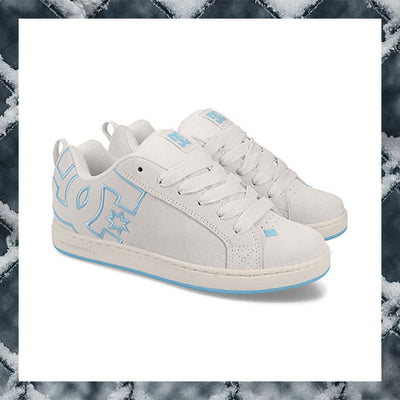 White sneakers with blue accents on a marble background